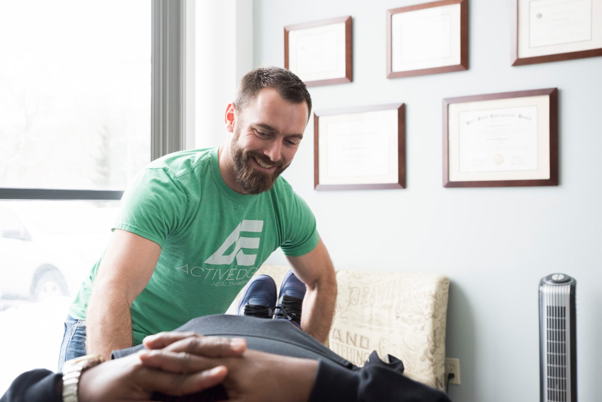 an Active Edge chiropractor applying a chiropractic adjustment technique to a patient in Columbus Ohio