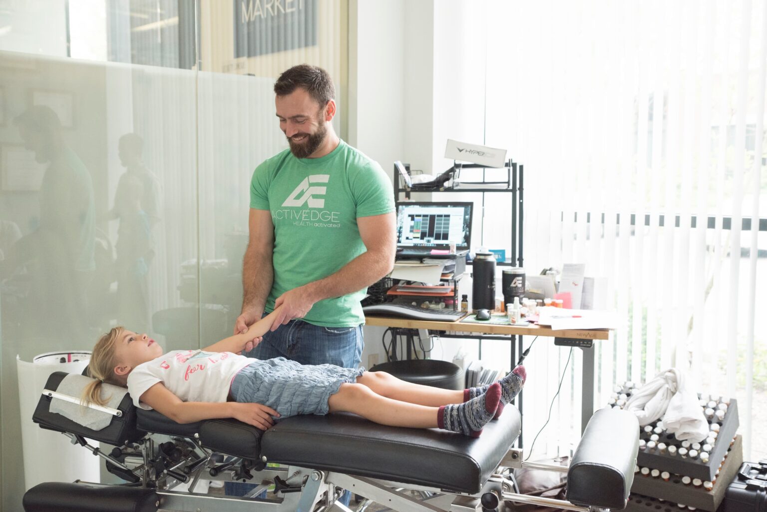 Chiropractic adjustment on a female child