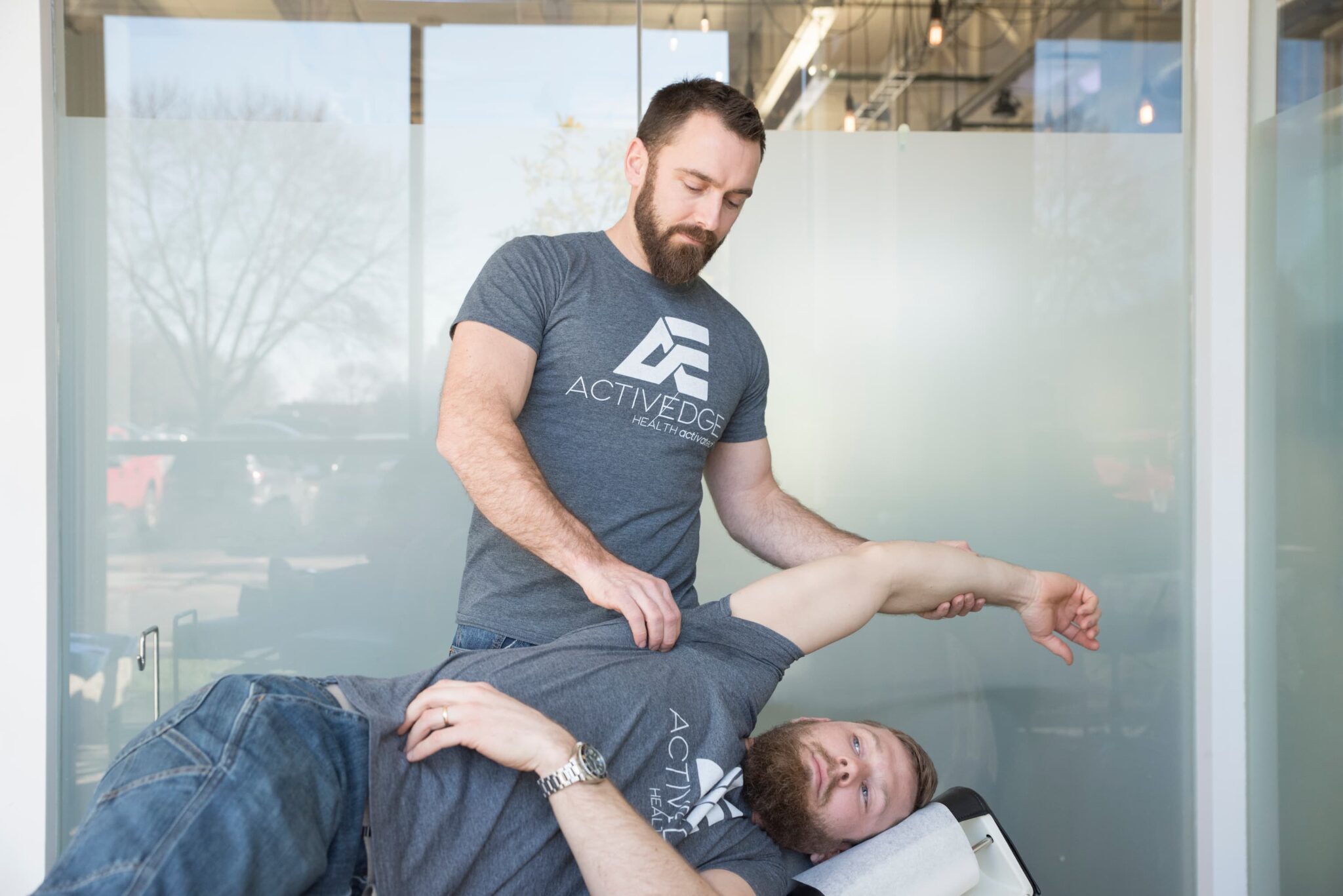 Active Edge chiropractors demonstrating their chiropractic techniques