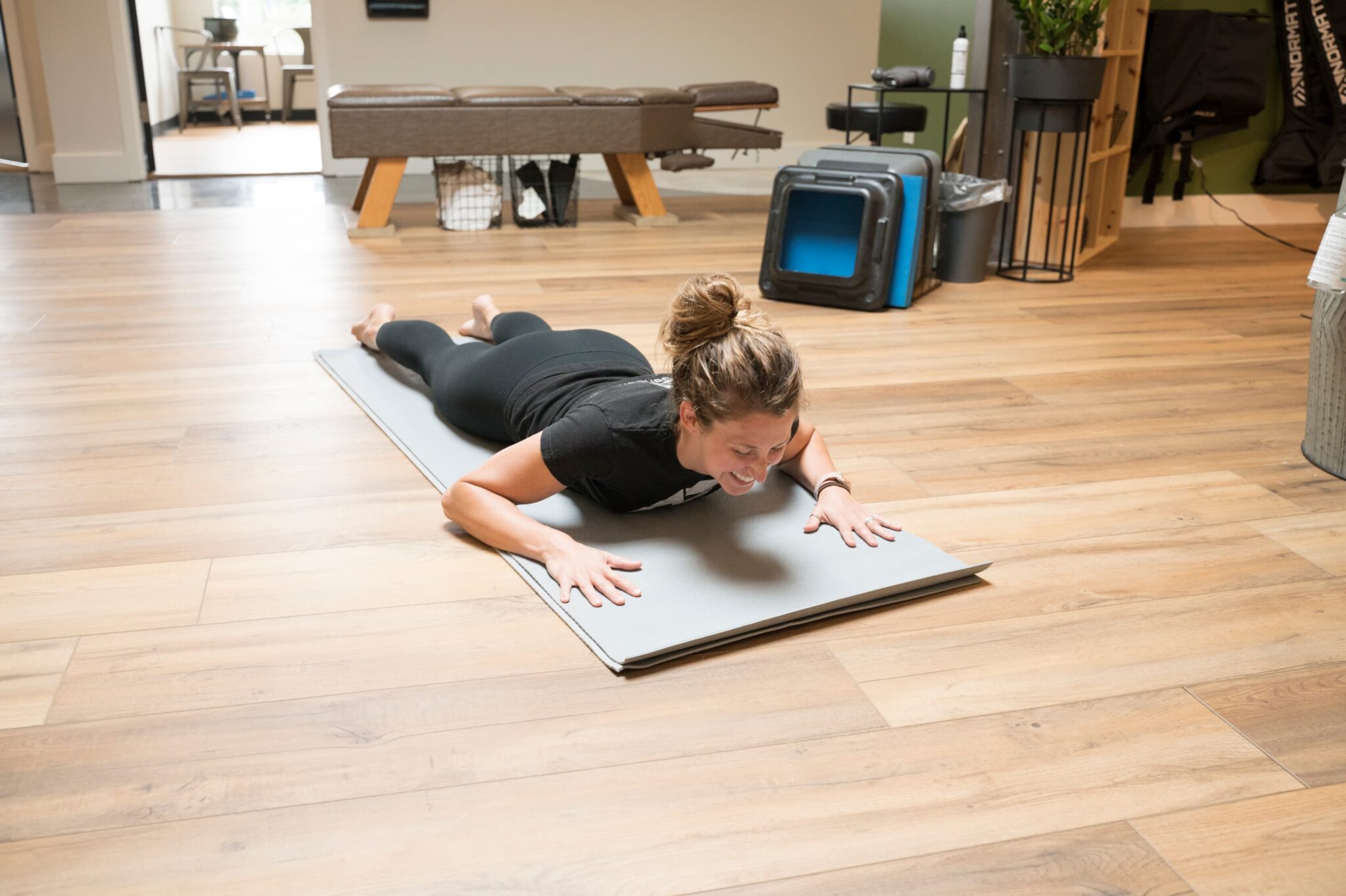 an Active Edge specialist demonstrating herniated disc relief treatment in Columbus Ohio with yoga and stretching