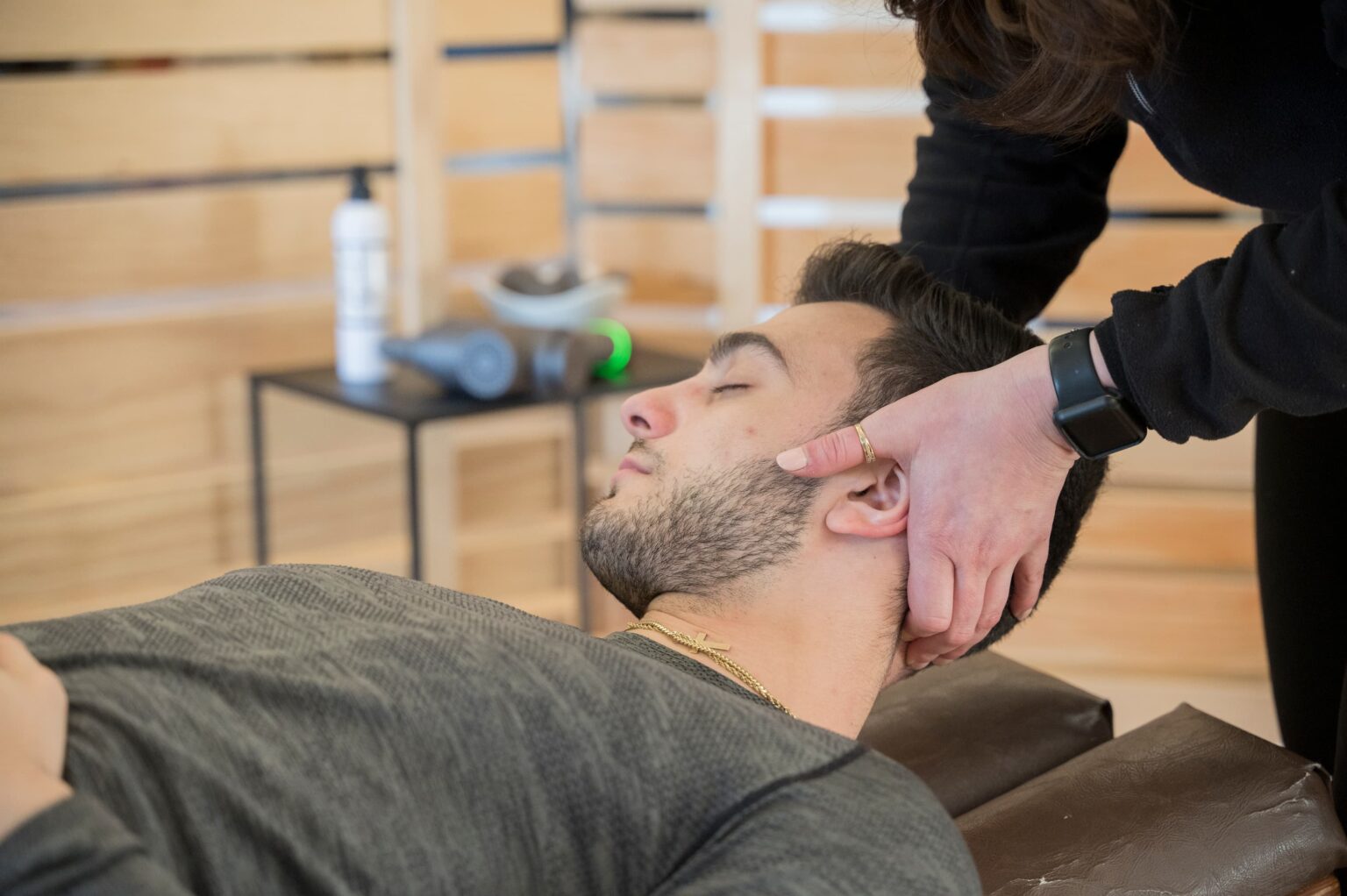 a man receiving neck chiropractic adjustment in Columbus Ohio